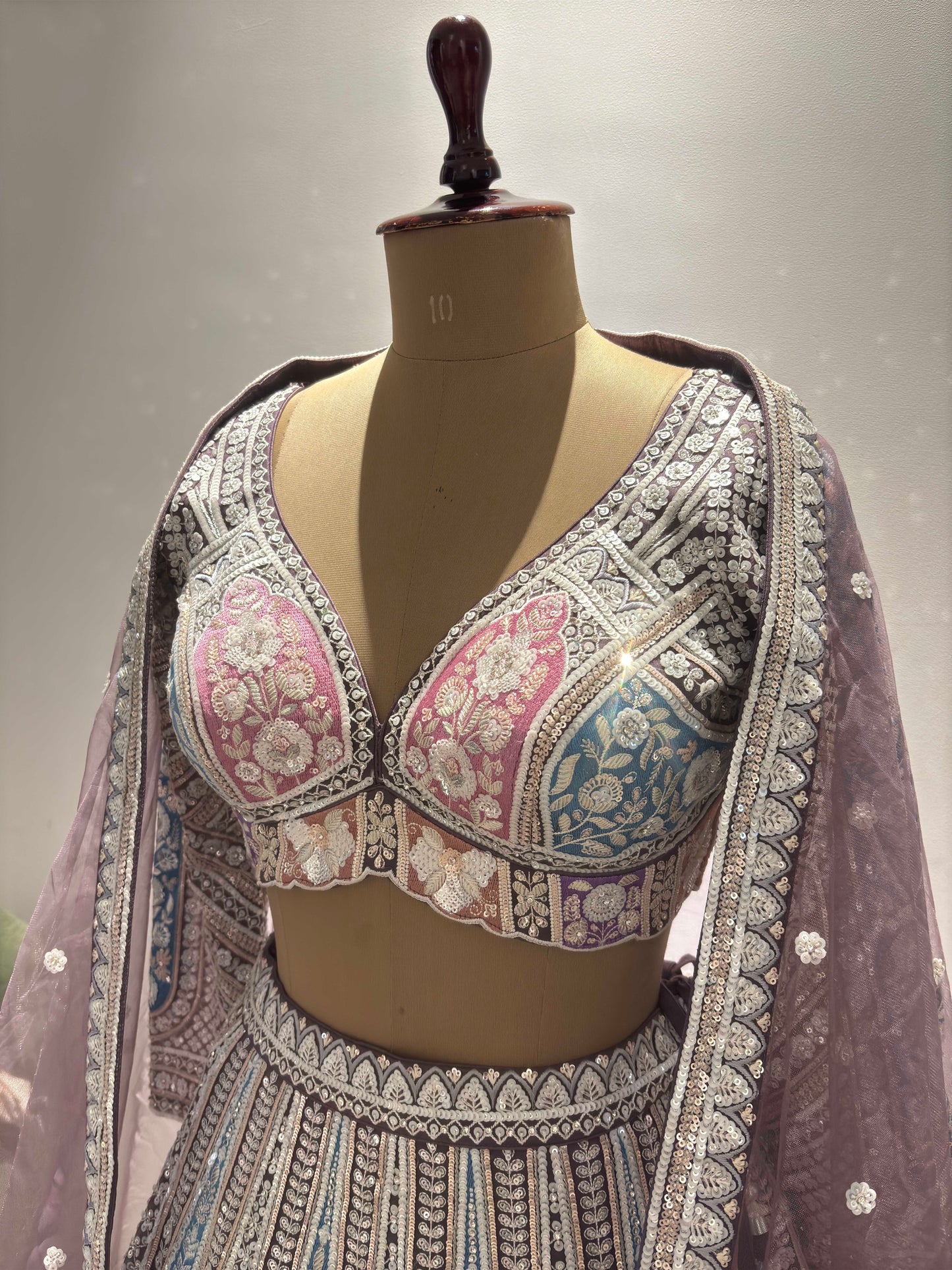 The Powder-Purple Colour Lehanga with Sequnis and Zari Work