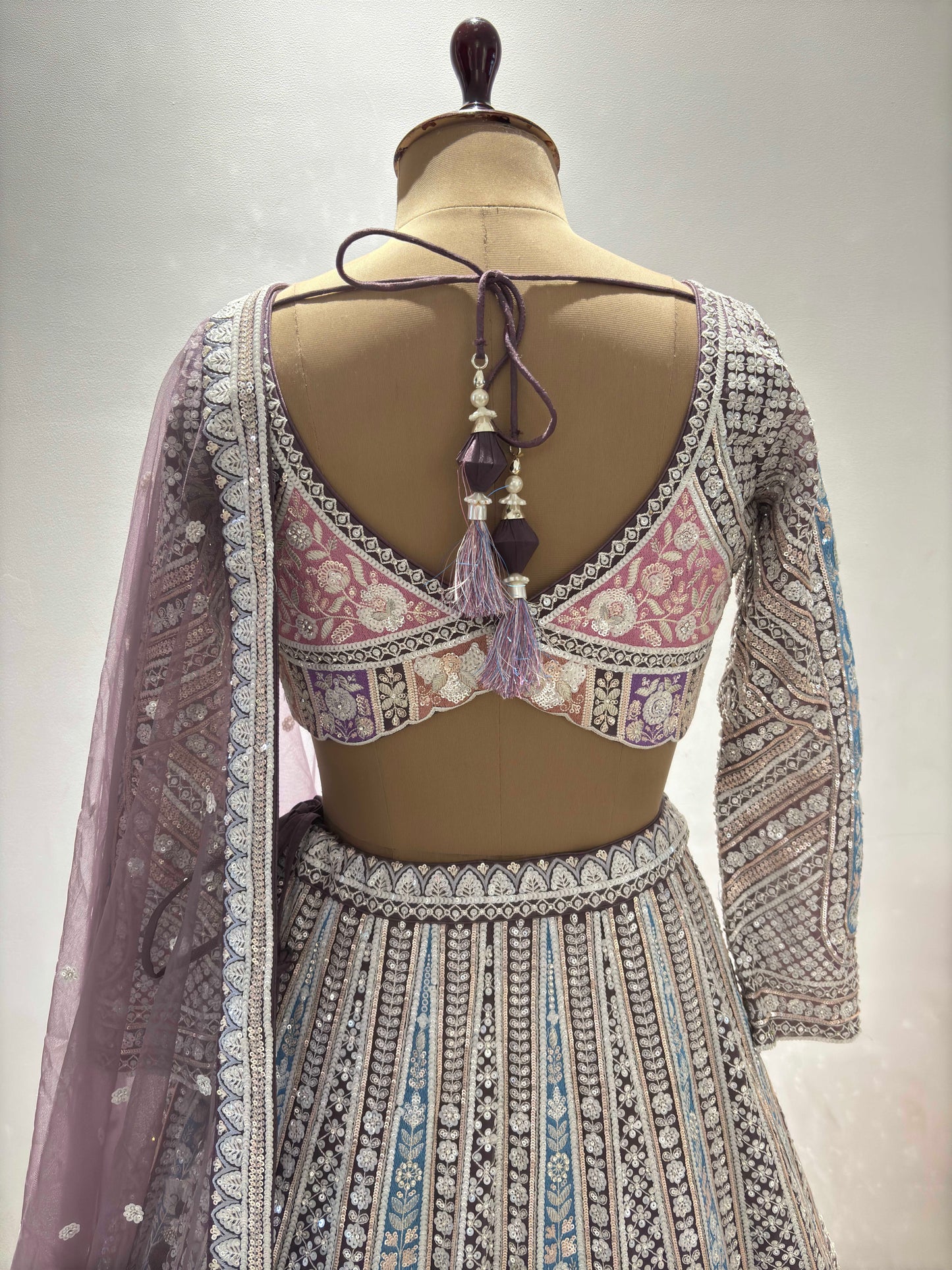 The Powder-Purple Colour Lehanga with Sequnis and Zari Work