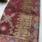 Wine Designer Woven Saree with Floral Paisley Motifs & Rich Border
