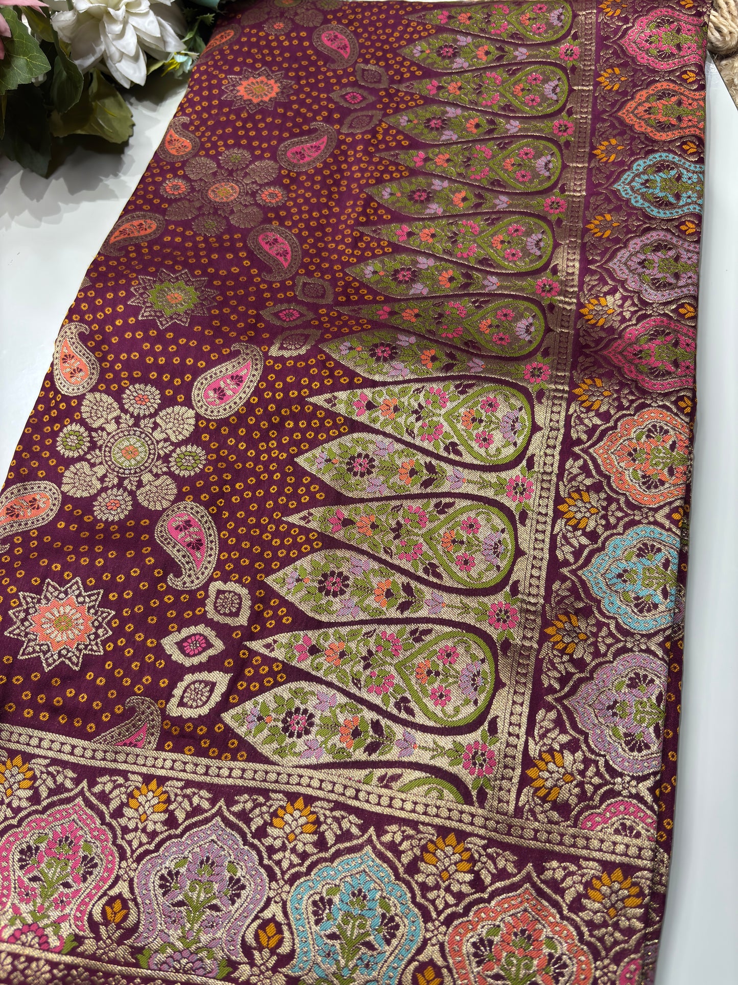 Wine Designer Woven Saree with Floral Paisley Motifs & Rich Border