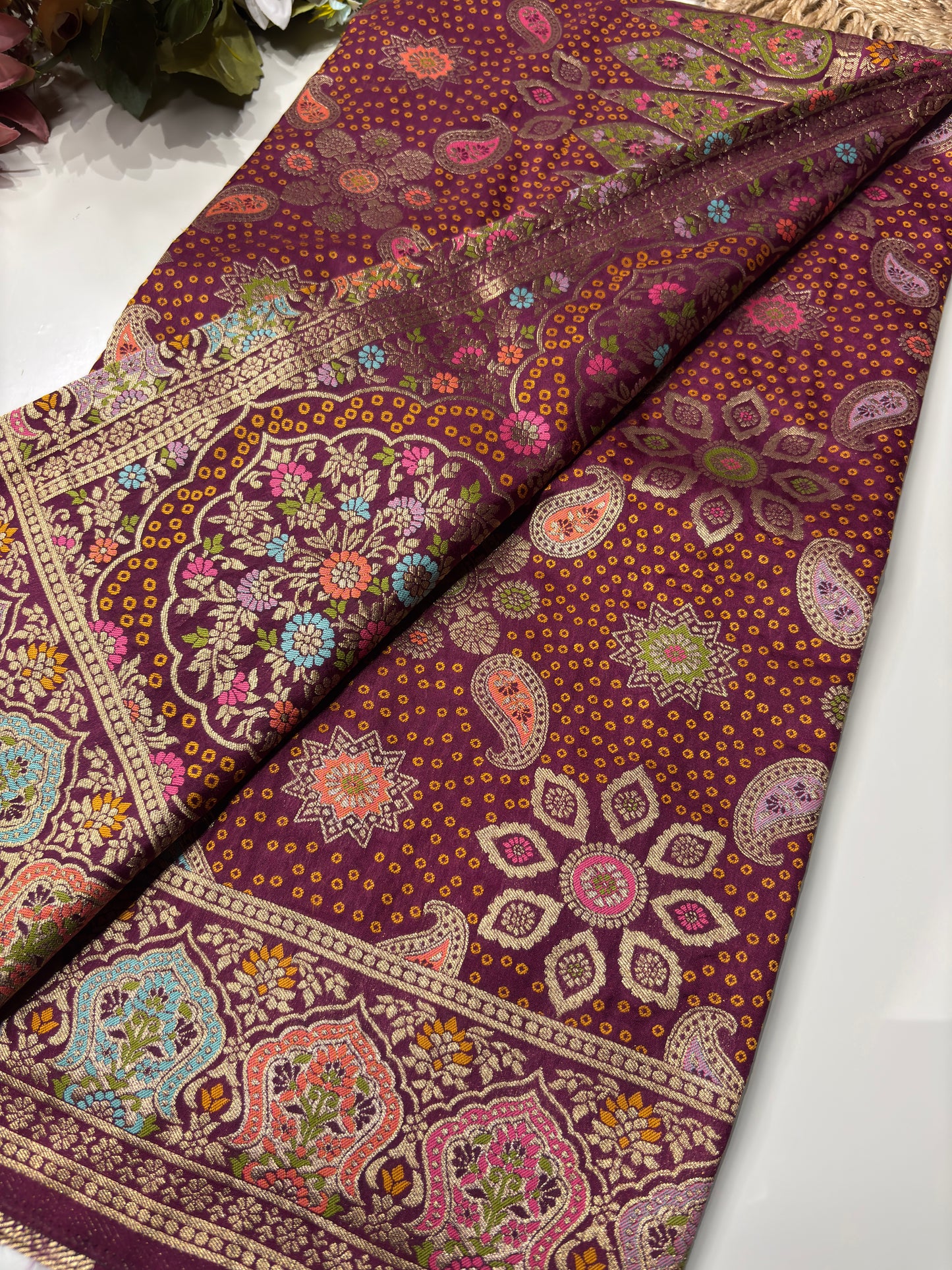 Wine Designer Woven Saree with Floral Paisley Motifs & Rich Border
