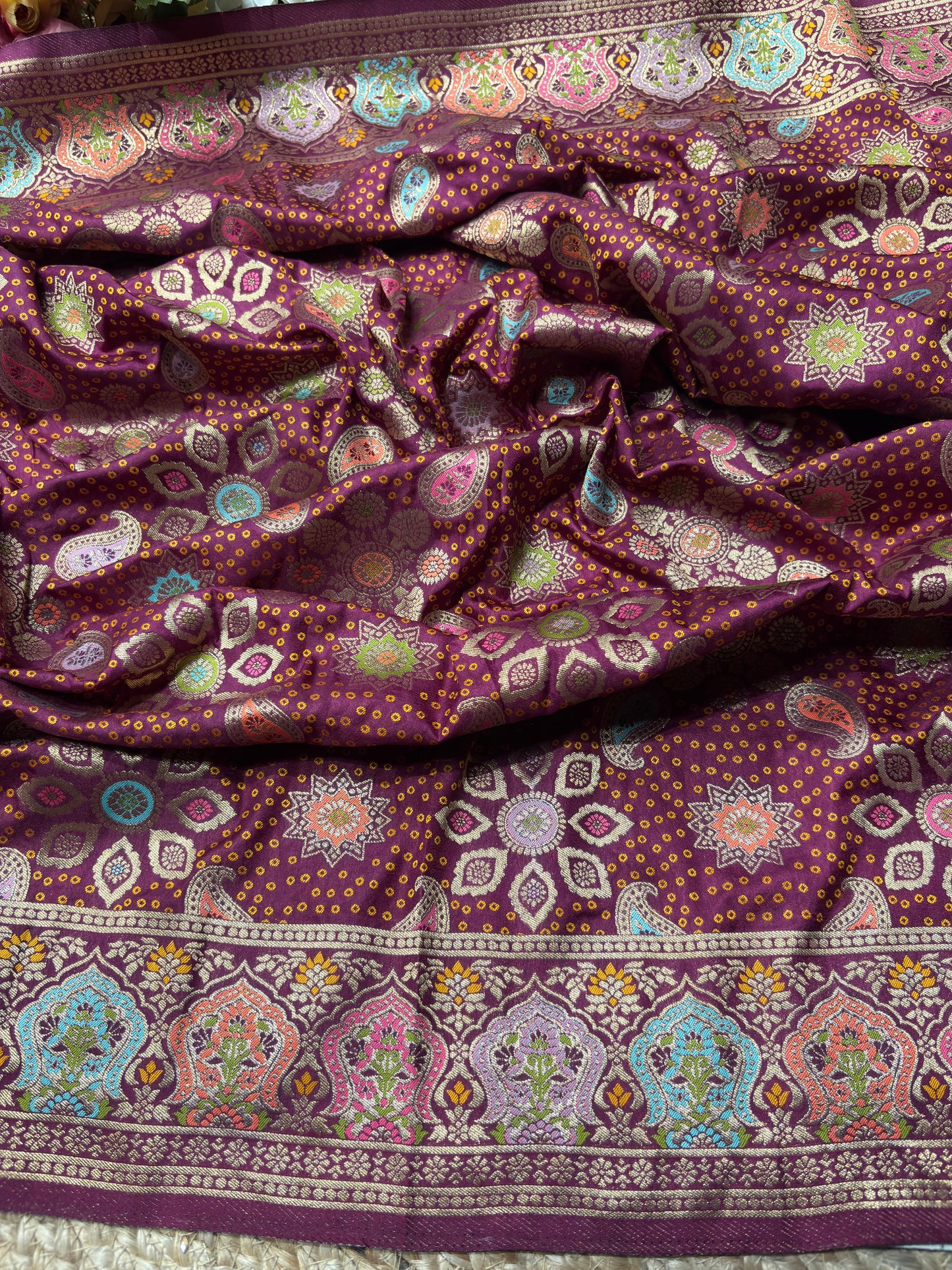 Wine Designer Woven Saree with Floral Paisley Motifs & Rich Border