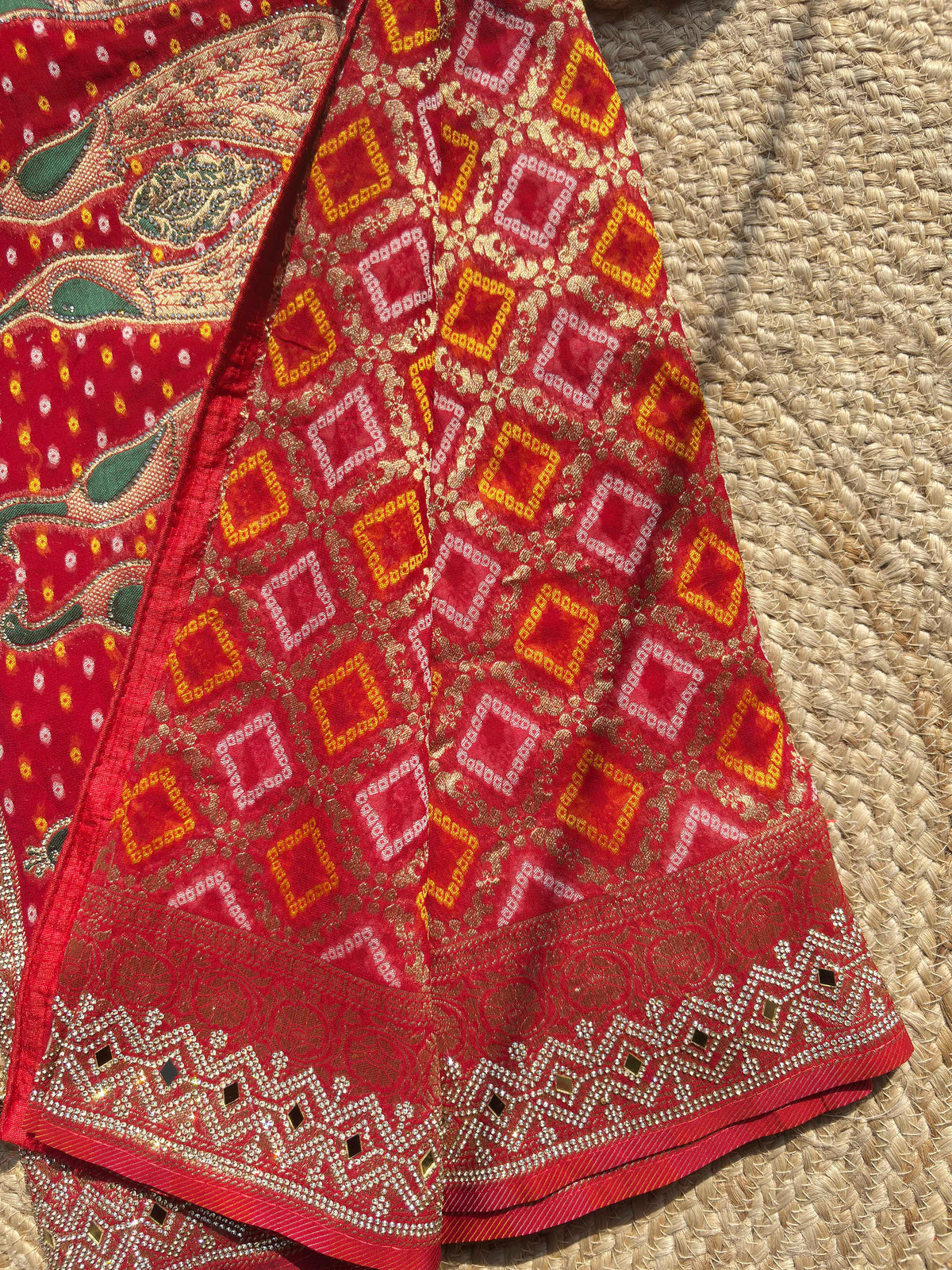 Royal Red Bandhani Saree with Peacock Embroidery & Heavy Zari Border