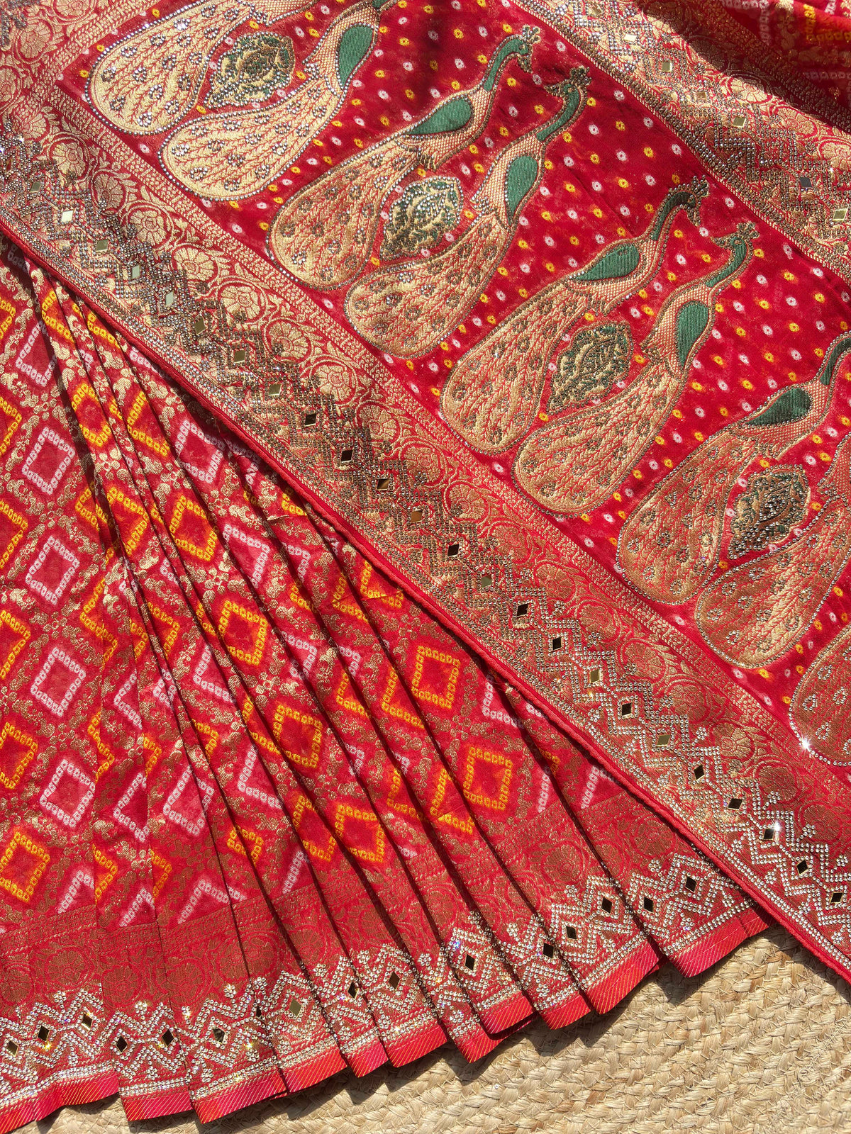 Royal Red Bandhani Saree with Peacock Embroidery & Heavy Zari Border