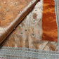 Orange Designer Saree with Elephant Embroidery & Rich Zari Border