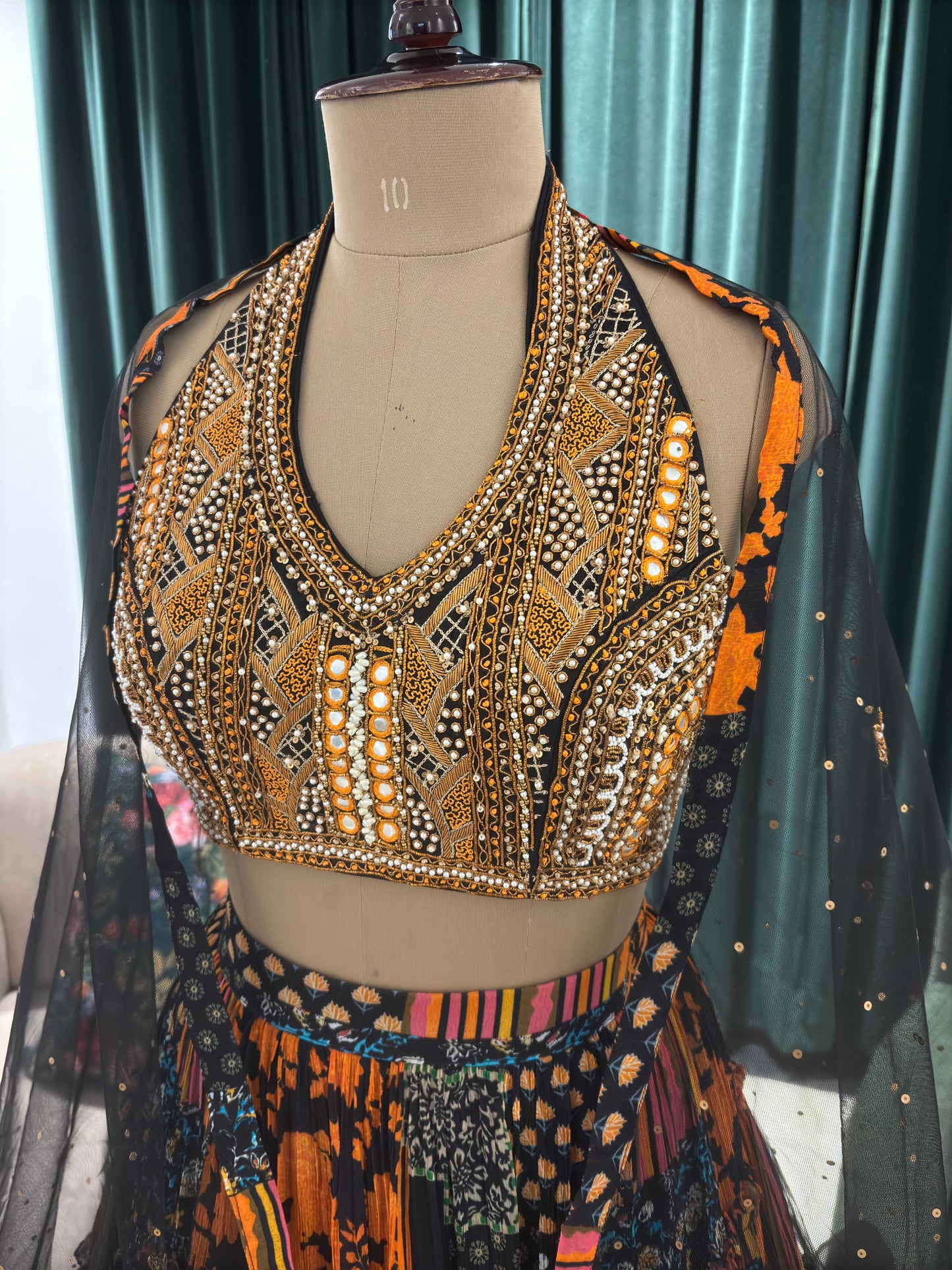 Black Patchwork Lehenga Choli with Green Net Dupatta