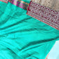 Elegant Turquoise Floral Banarasi Saree with Embroidered Border