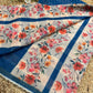 Blue Floral Printed Cotton Saree with Ikat Style Border