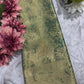 Green Kanchipuram Silk Saree with Floral Zari Weaving