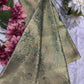 Green Kanchipuram Silk Saree with Floral Zari Weaving