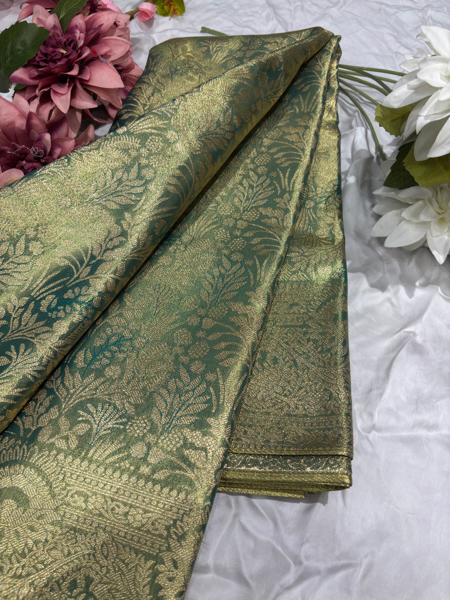 Green Kanchipuram Silk Saree with Floral Zari Weaving