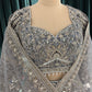 Designer Lehenga with Intricate Threadwork and Net Dupatta