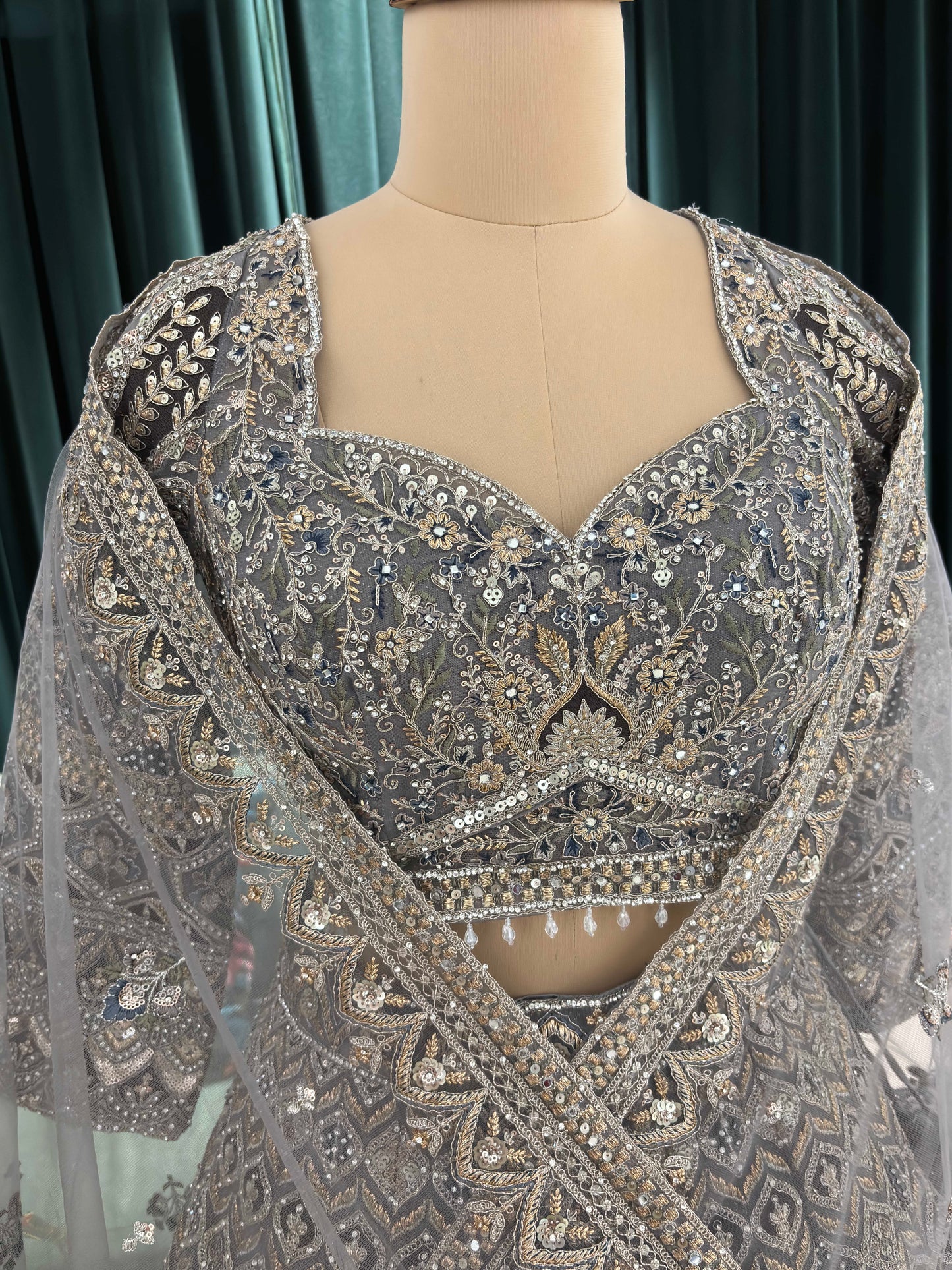 Designer Lehenga with Intricate Threadwork and Net Dupatta