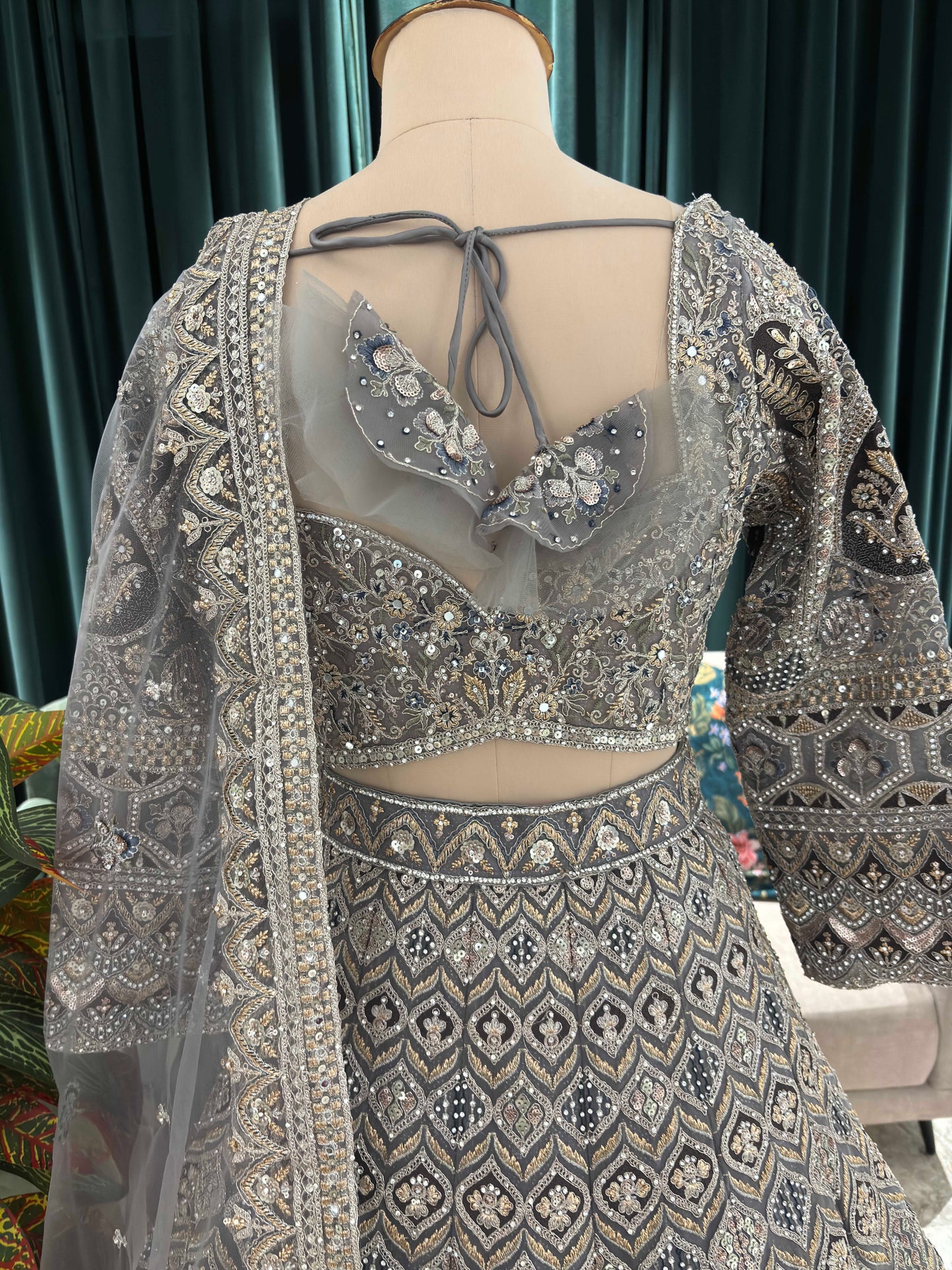 Designer Lehenga with Intricate Threadwork and Net Dupatta