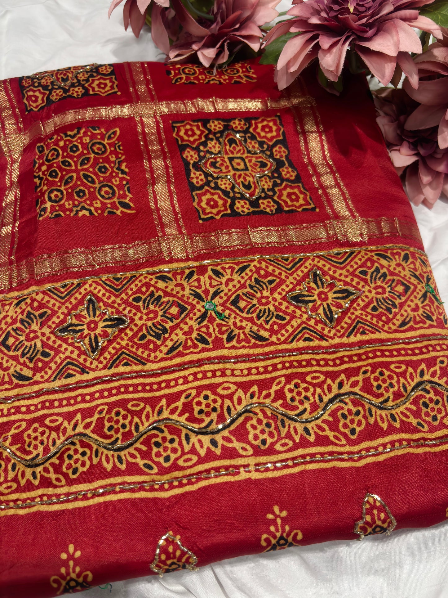 Classic Red Printed Saree with Ethnic Motifs Border