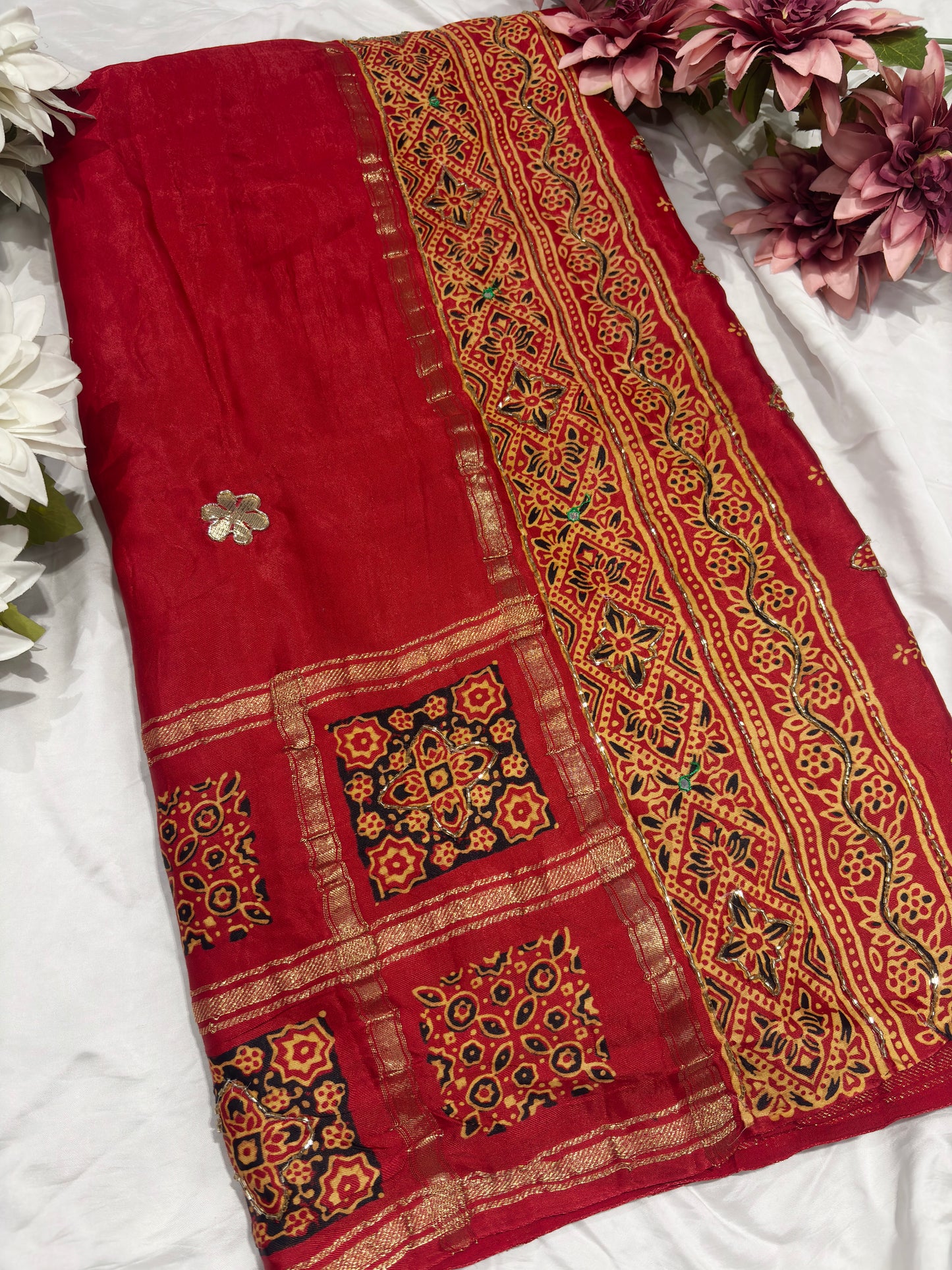 Classic Red Printed Saree with Ethnic Motifs Border