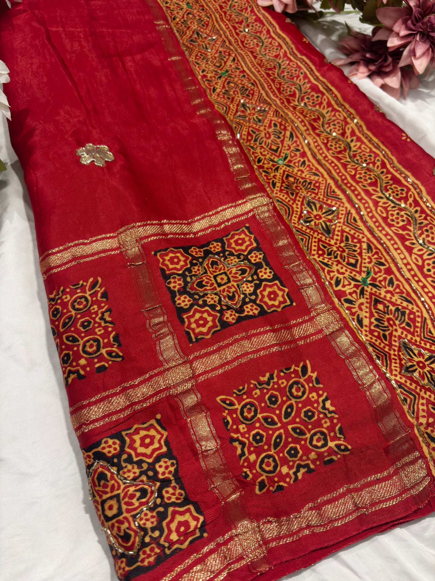 Classic Red Printed Saree with Ethnic Motifs Border