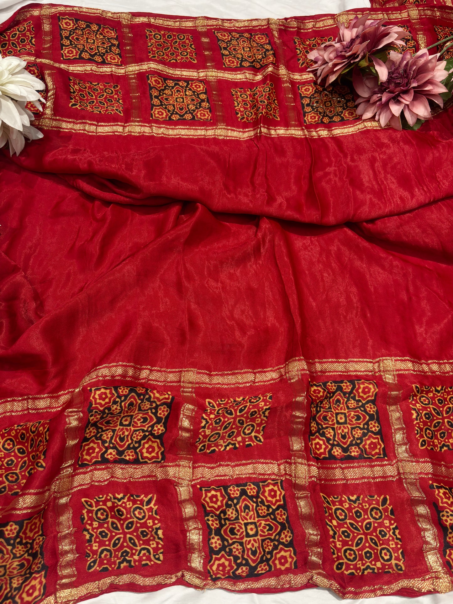 Classic Red Printed Saree with Ethnic Motifs Border