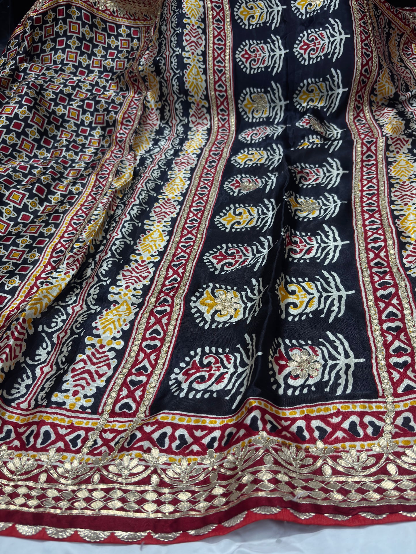 Elegant Red Silk Saree with Golden Zari Floral Design