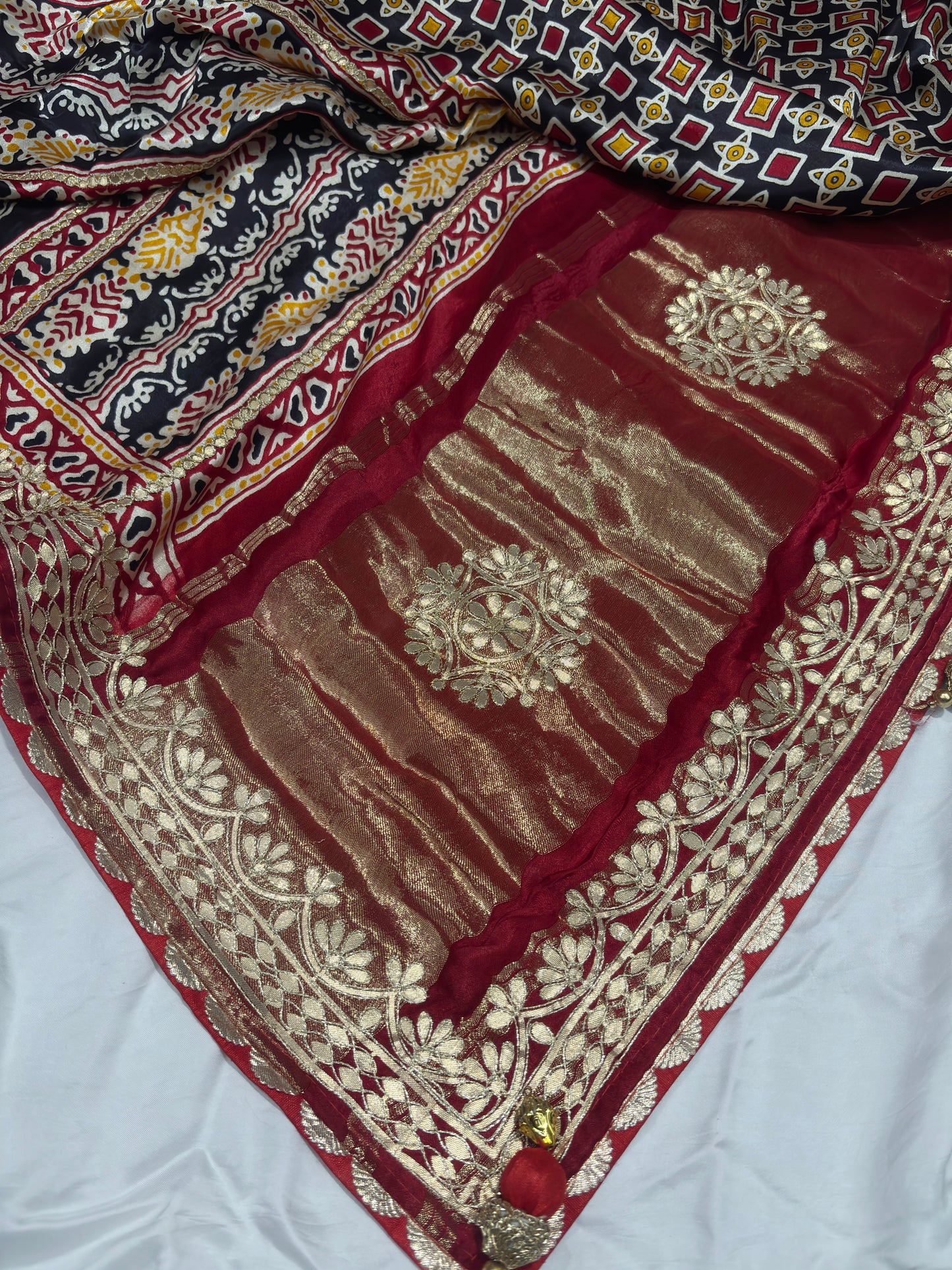 Elegant Red Silk Saree with Golden Zari Floral Design