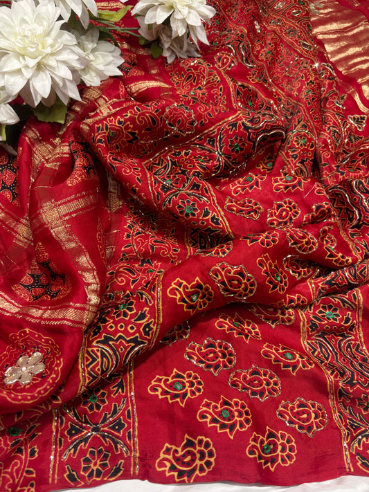 Vibrant Red Printed Saree with Traditional Floral & Ethnic Motifs