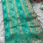 Teal Green Patola Silk Saree with Gota Patti Floral Embroidery & Pearl Work