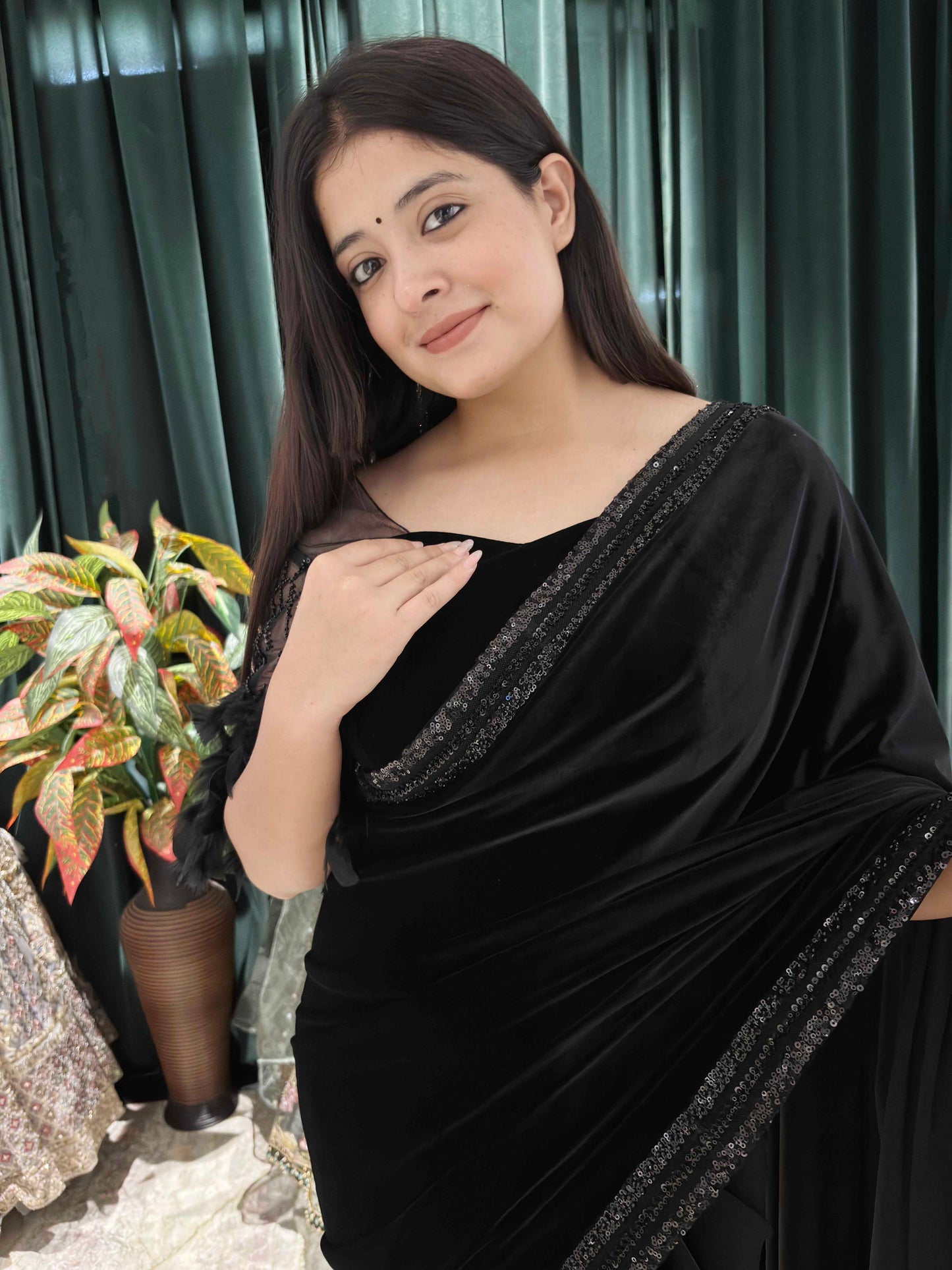 Elegance Saree With Feather Accents And Sequin Embellishments