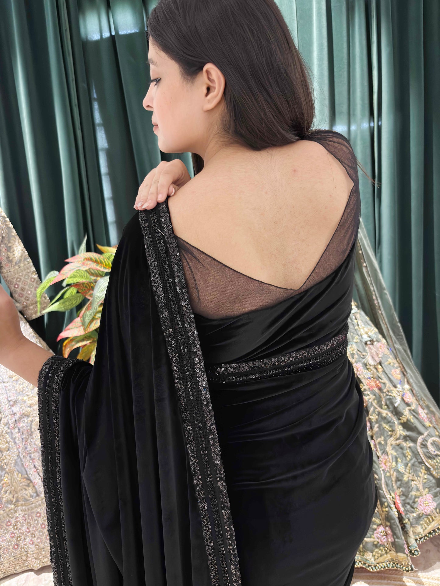 Elegance Saree With Feather Accents And Sequin Embellishments