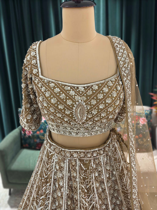 Royal Champagne grand Lehenga With Intricate Heritage Embroidery