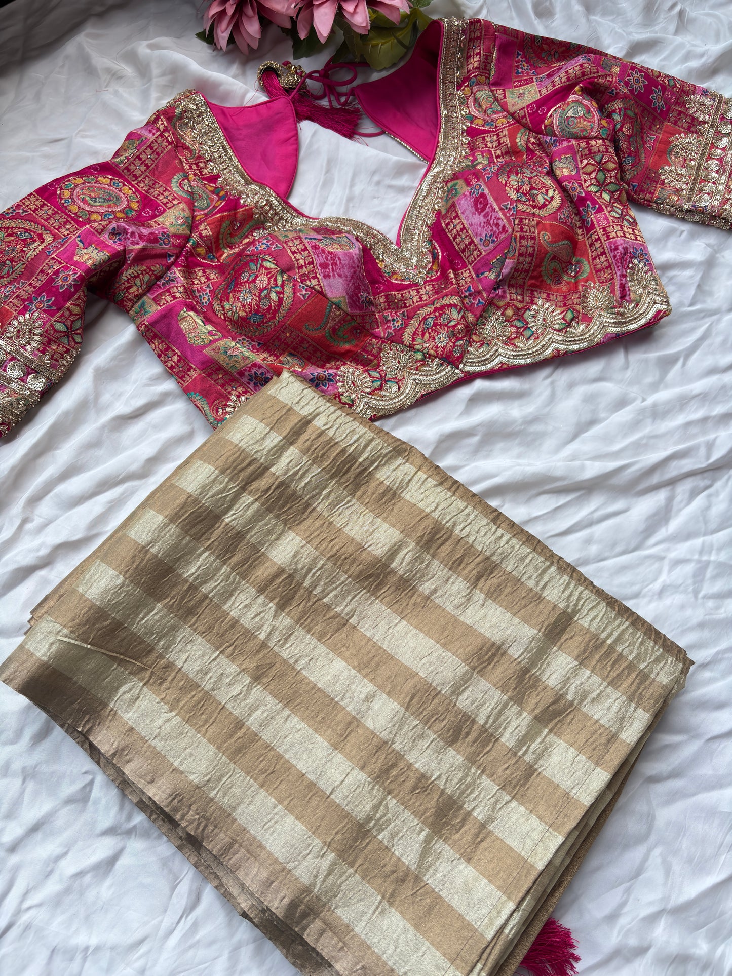 Beige Striped Saree with Pink Designer Blouse and Zari Work