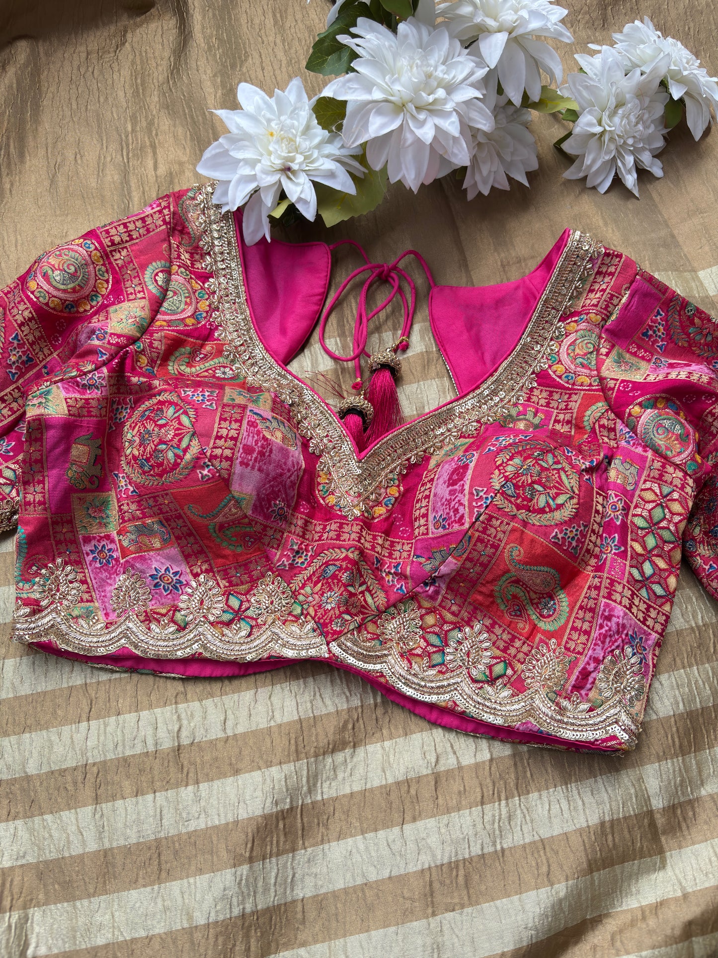 Beige Striped Saree with Pink Designer Blouse and Zari Work