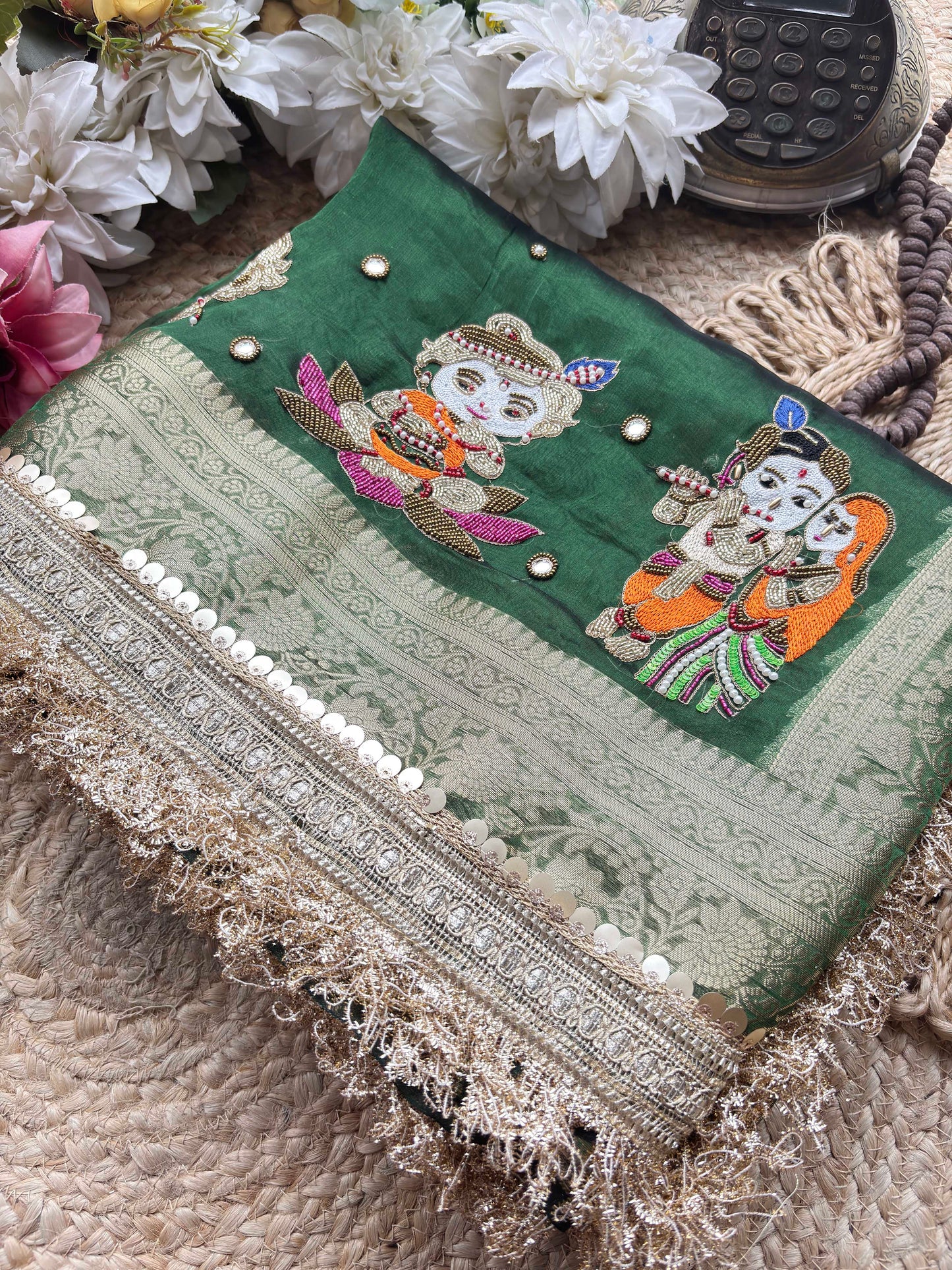 Emerald Green Ladoo Gopal Embroidered Saree with Ornate Gold Border