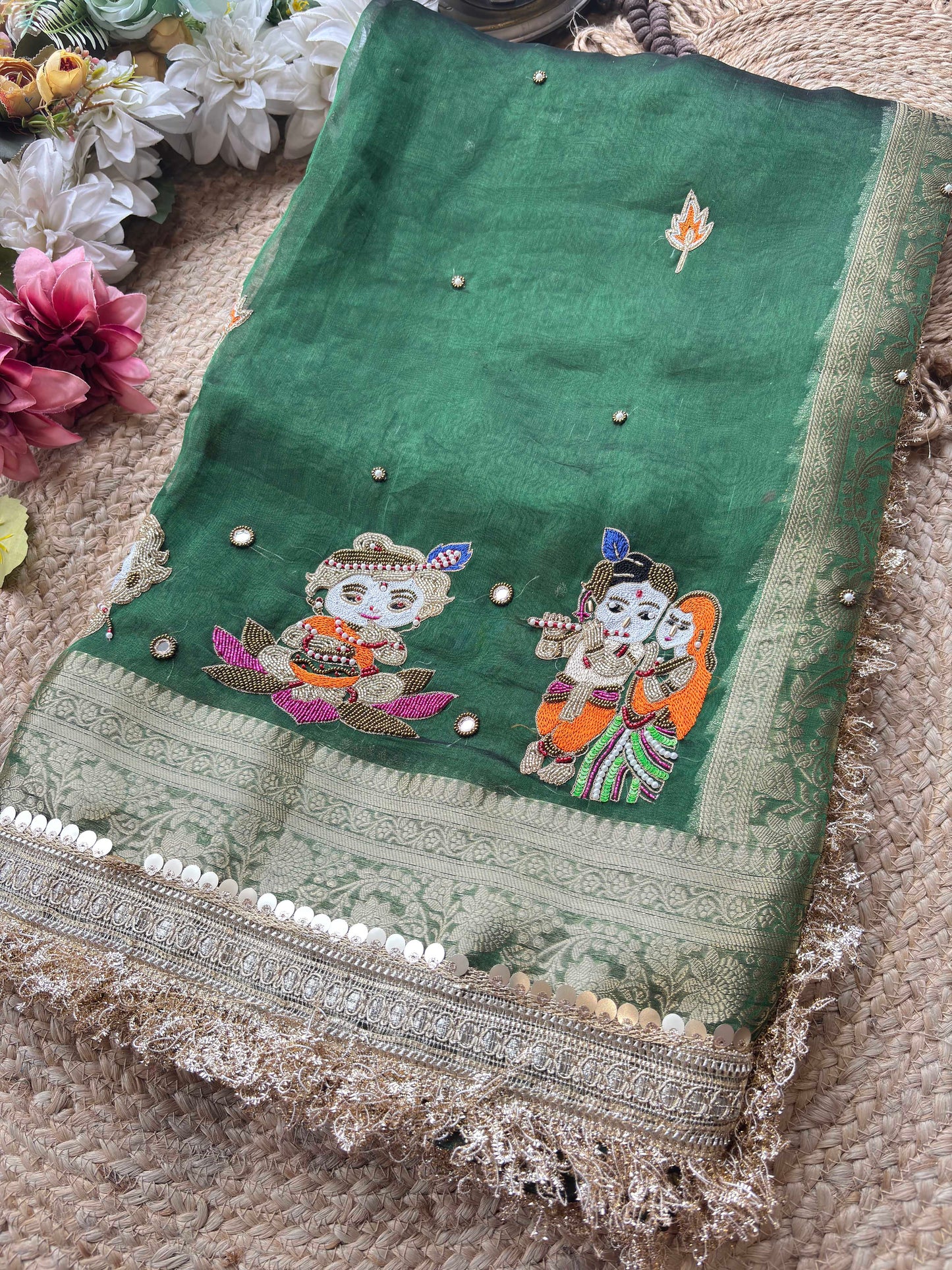 Emerald Green Ladoo Gopal Embroidered Saree with Ornate Gold Border