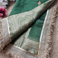 Emerald Green Ladoo Gopal Embroidered Saree with Ornate Gold Border