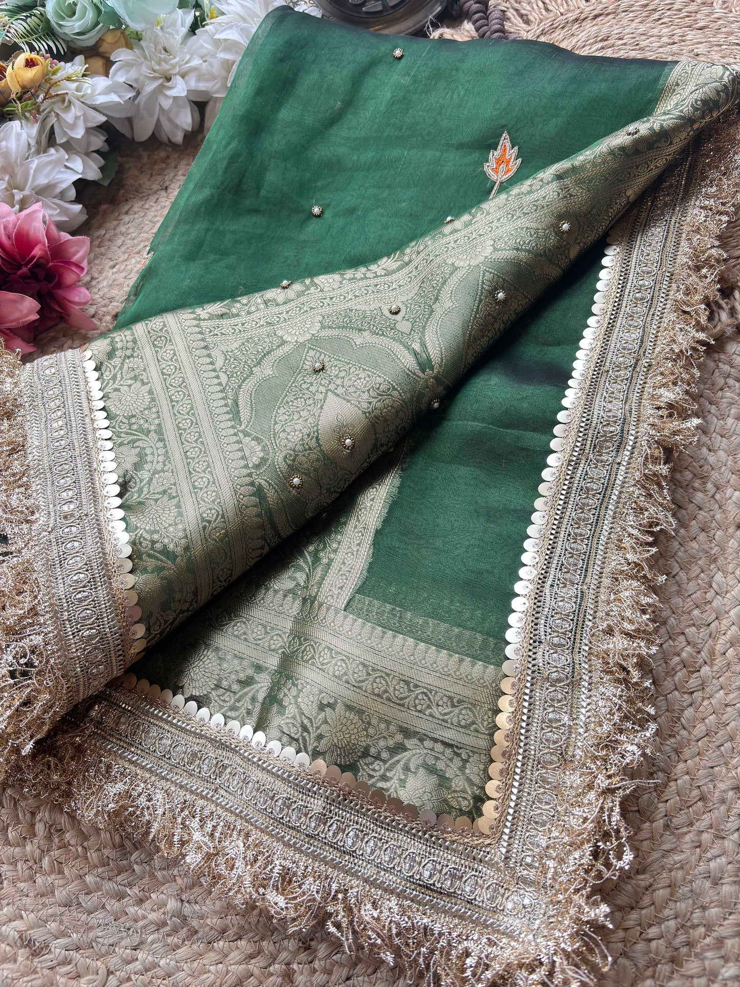 Emerald Green Ladoo Gopal Embroidered Saree with Ornate Gold Border