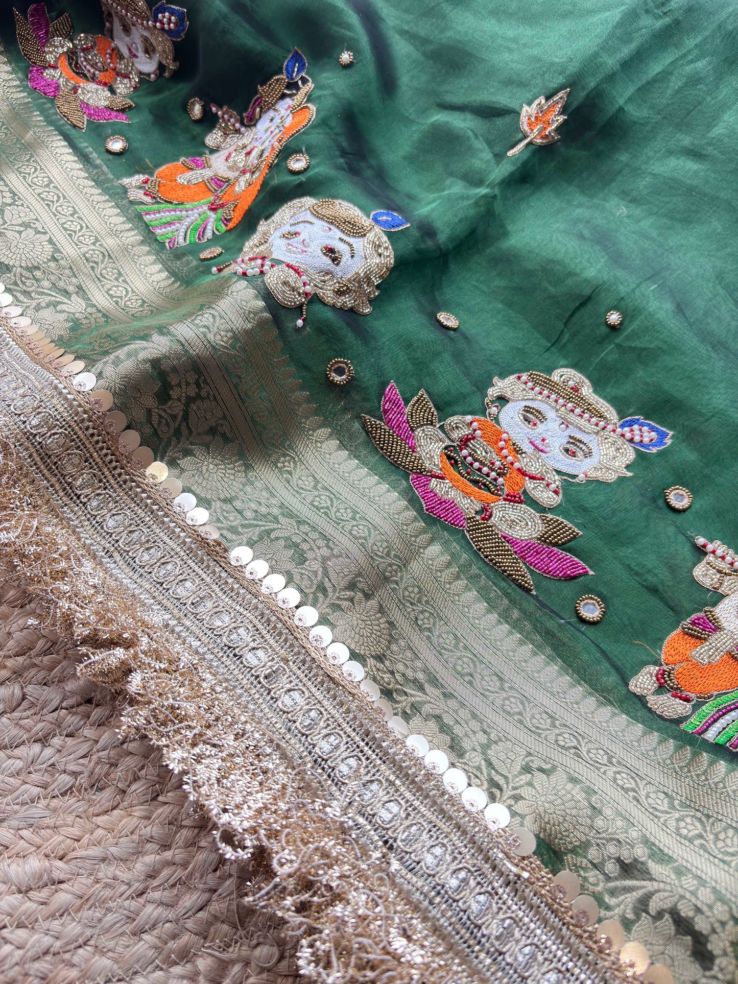 Emerald Green Ladoo Gopal Embroidered Saree with Ornate Gold Border