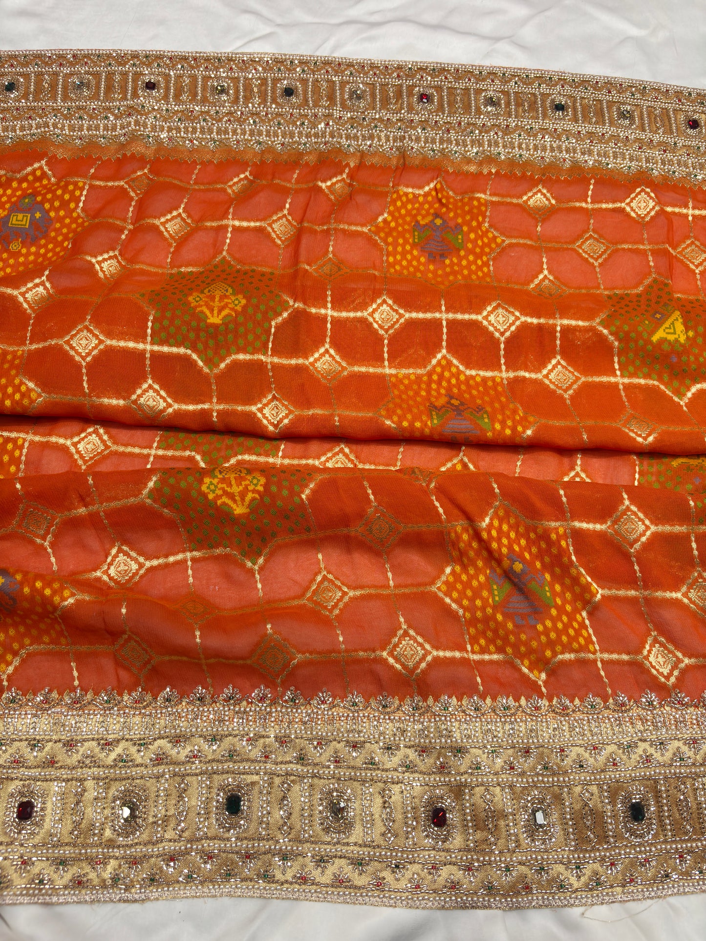 Grand Radiant Orange Saree with Gemstone Border