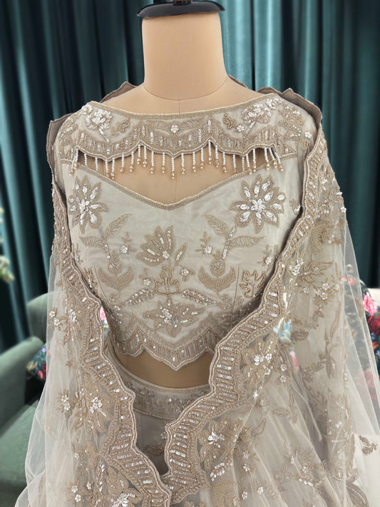 Designer Lehenga with Embellished Blouse and Intricate Dupatta