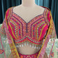 Elegant Embroidered Lehenga with Mirror Work & Tassel Accents