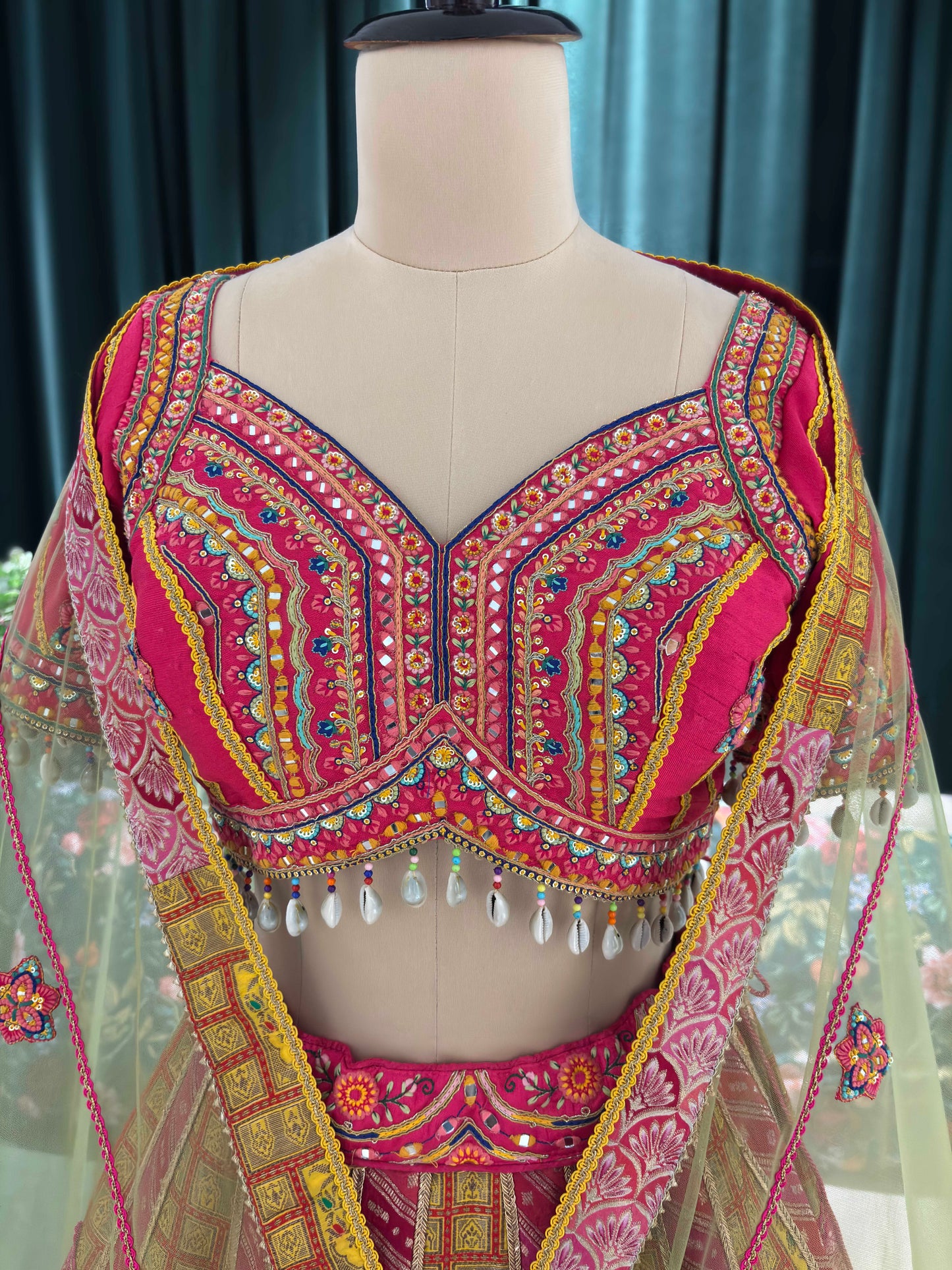 Elegant Embroidered Lehenga with Mirror Work & Tassel Accents