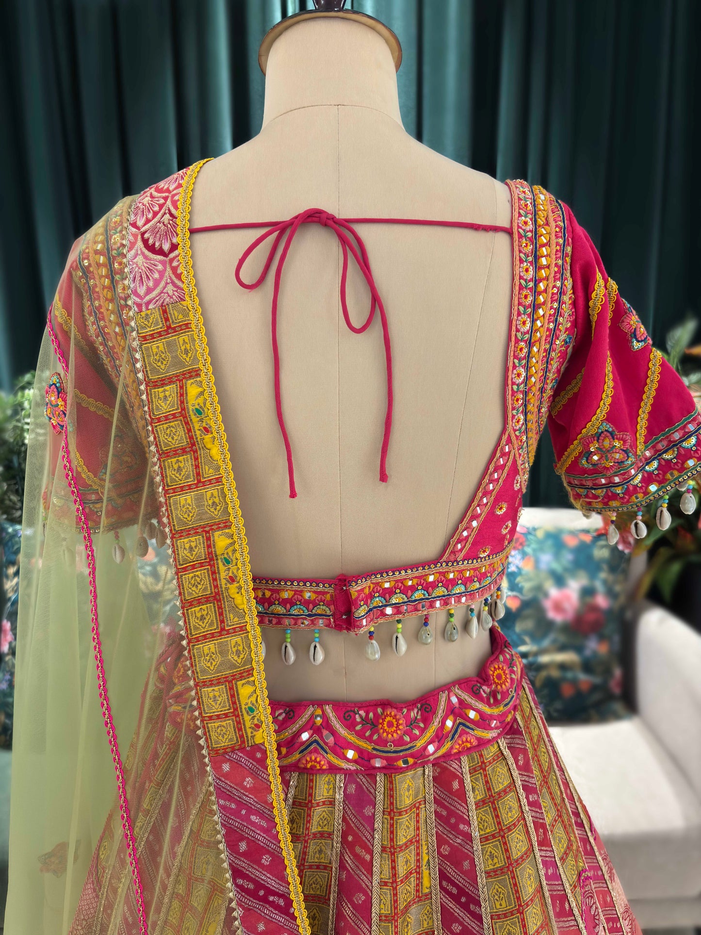 Elegant Embroidered Lehenga with Mirror Work & Tassel Accents