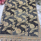 Black Designer Khaddi Georgette Saree with Gold Floral Weaving & Embroidered Border