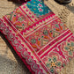 Turquoise Patola Saree with Pink Embellished Floral Border