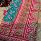 Turquoise Patola Saree with Pink Embellished Floral Border