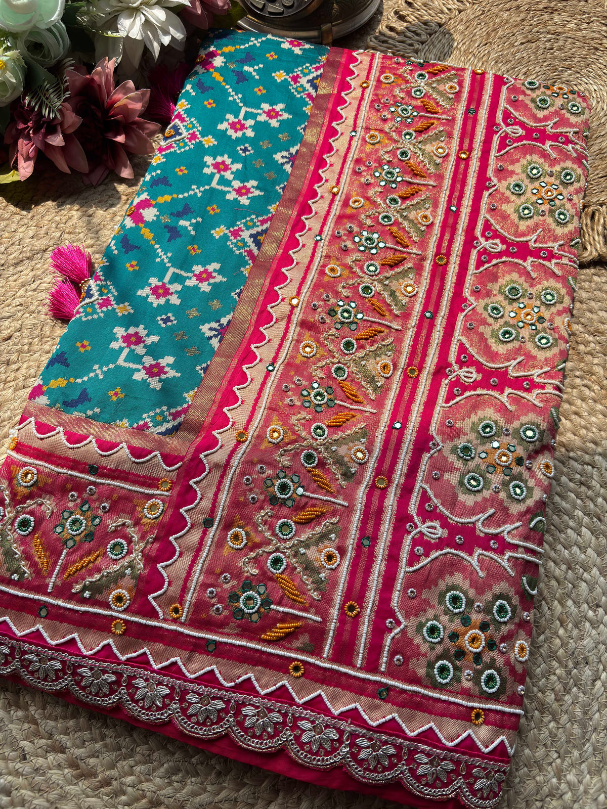 Turquoise Patola Saree with Pink Embellished Floral Border