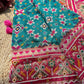 Turquoise Patola Saree with Pink Embellished Floral Border