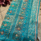 Turquoise & Ivory Patola Embellished Saree with Floral Woven Detail