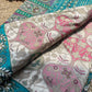 Turquoise & Ivory Patola Saree with Pearl Embellished Border