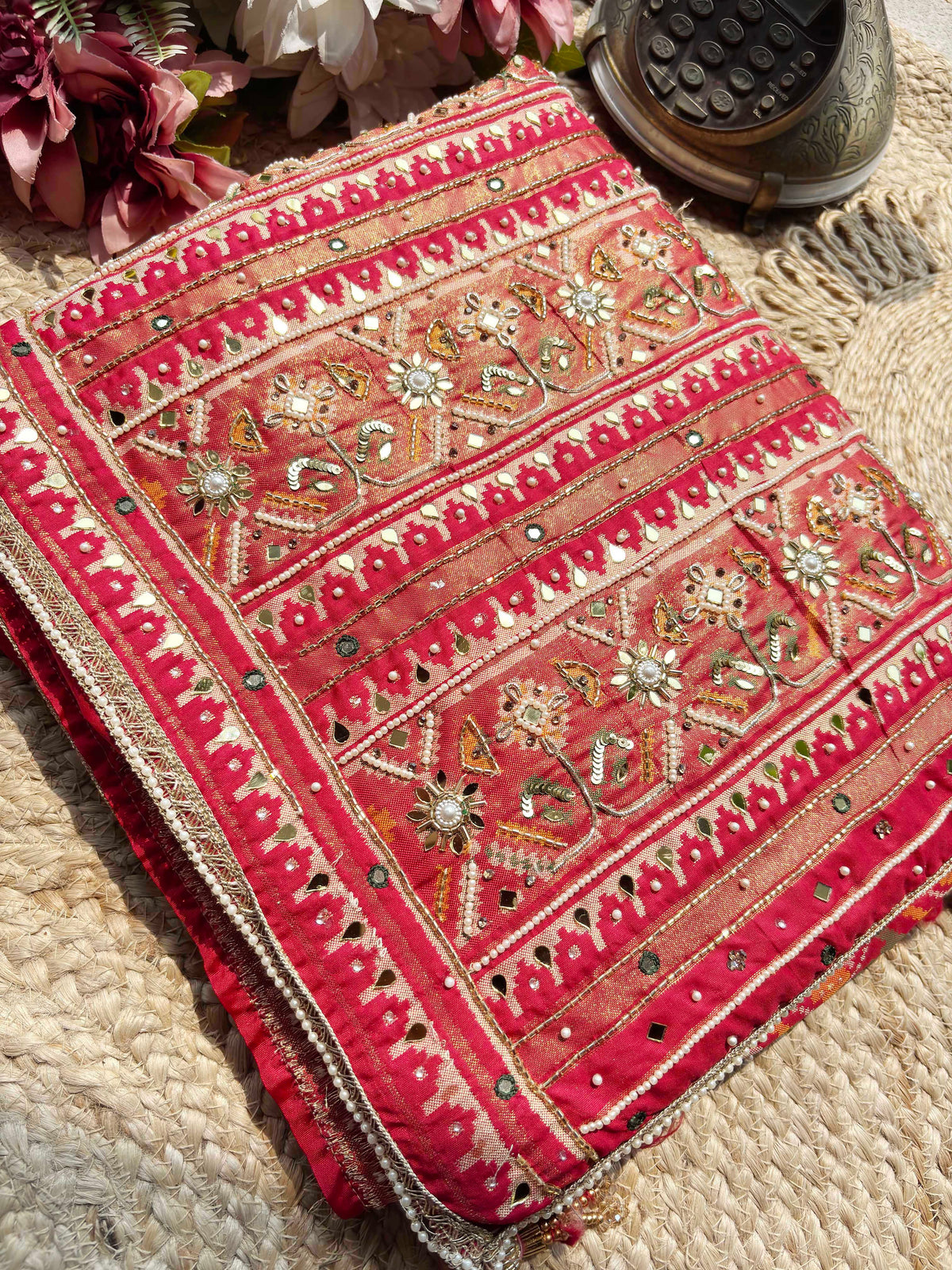 Rani Pink Patola Saree with Elephant Motifs & Embellished Border