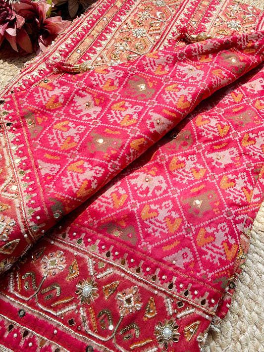 Rani Pink Patola Saree with Elephant Motifs & Embellished Border